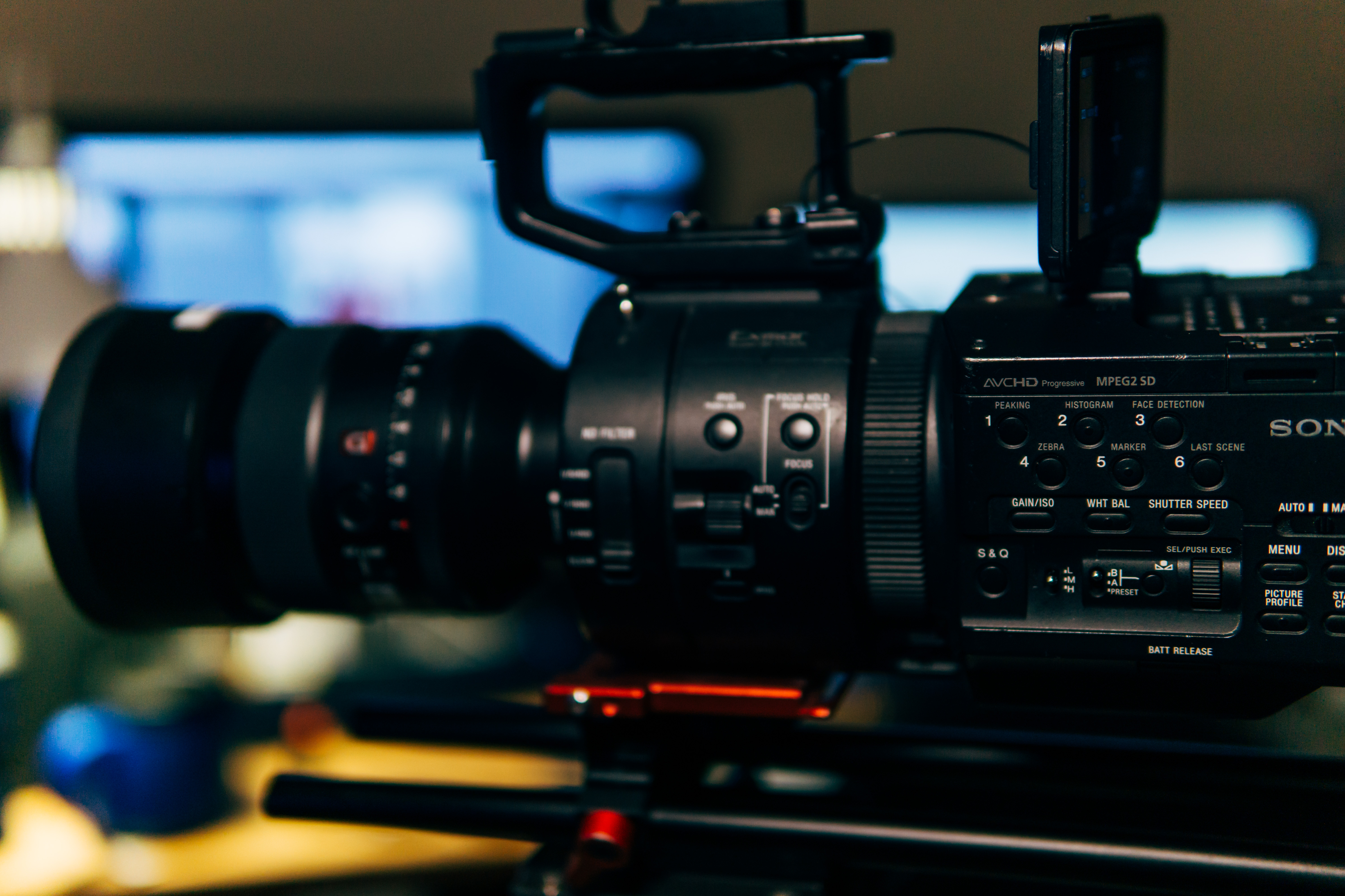 Cinematic event recap video frame featuring lighting setup